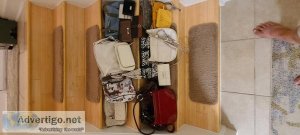 Assorted women s clothing and accessories for sale.