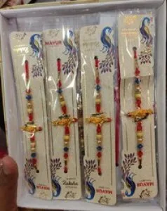 Buy designer lord krishna ji stone rakhi at wholesale price