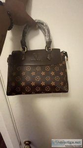 Louis Vuitton bag brand new with no scratches and wrapped up