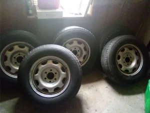set of 4 17 inch tires rims with a spare Ford 6 lugs