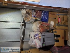 A storage unit with 80 to 100 boxes of new items