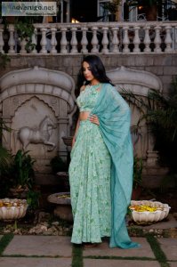 Buy elegant green organza embroidered draped skirt saree set