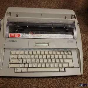 2 Typewritters. 1 Brothers and 1 Sharp