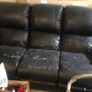 Black reclining couch and black leather chair that reclines