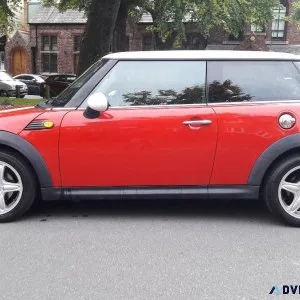 MINI COOPER WITH FULL LEATHER INTERIOR.