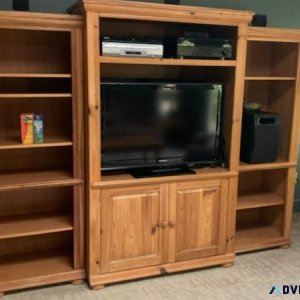 Entertainment center with matching coffee and end table
