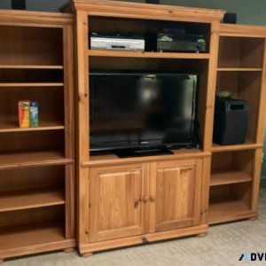 Entertainment center with matching coffee and end table