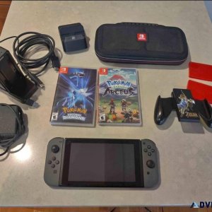 Nintendo Switch With Pokemon Games And Slim Dock