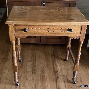 Antique wooden desk on metal wheels wooden chair 7 tulip lamp