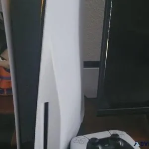 PS5 with 2 controllers and 3 games (FIFA 24 COD and NBA)