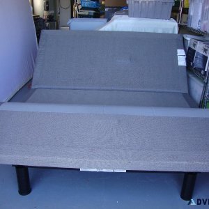 Adjustable queen bed with built in massager