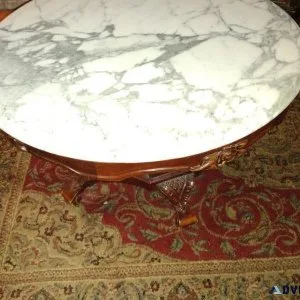 1945 marble top carved wood coffee table