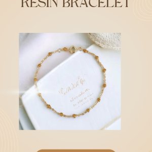 Elegance redefined: classic gold resin bracelet