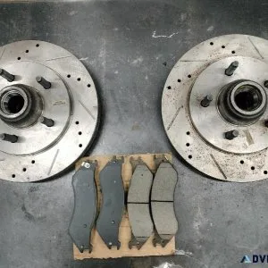 Front drilled and slotted rotors and pads