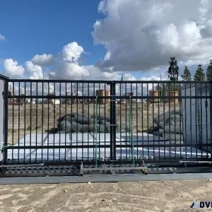 UNUSED RETRACTABLE WROUGHT IRON GATES WCOLUMNS