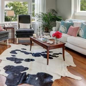 Enhance your living space with chic cowhide rug designs