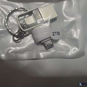 2 TB key chain thumb drive with adapter.