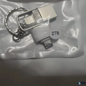 2 TB key chain thumb drive with adapter.