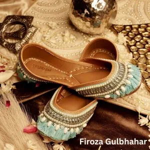 Bridal juttis have a mixture of traditional embroidery and conte