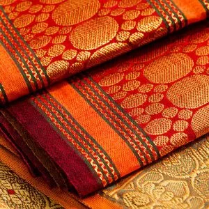 Plain sarees with elegant borders designed for graceful traditio