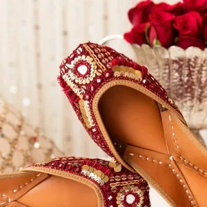 Shop red juttis by needledust for bridal special looks